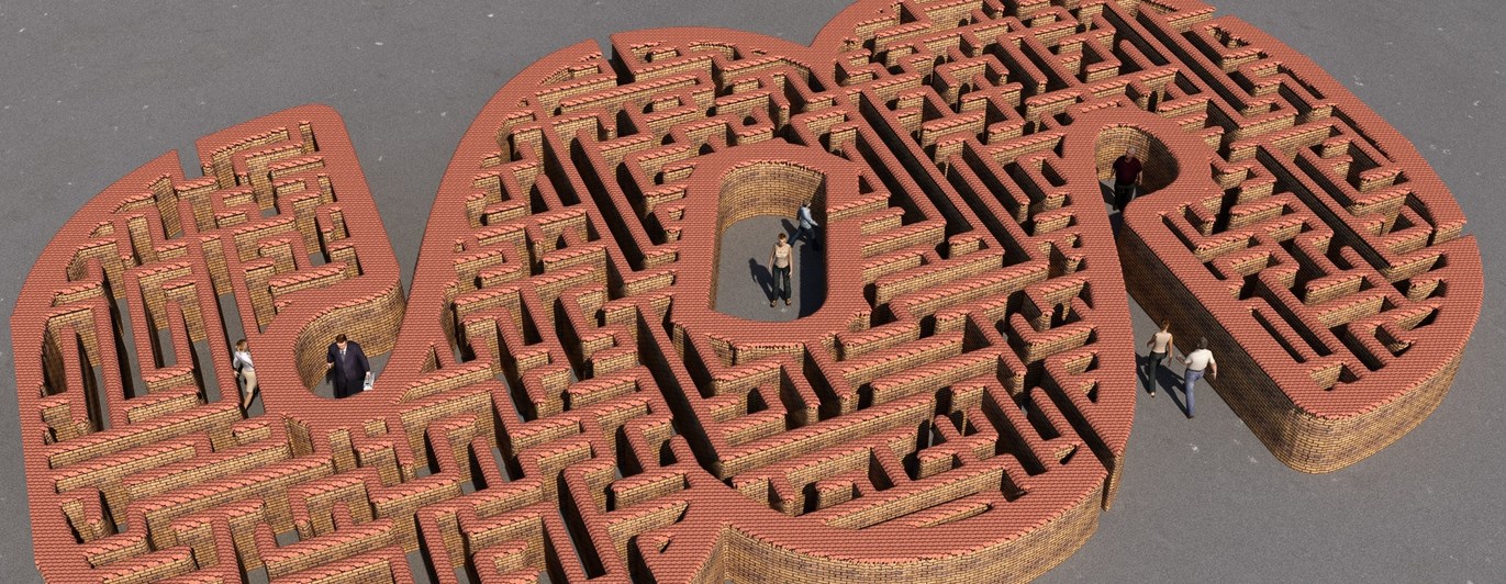 Bild som visar en labyrint formad som en paragraf.