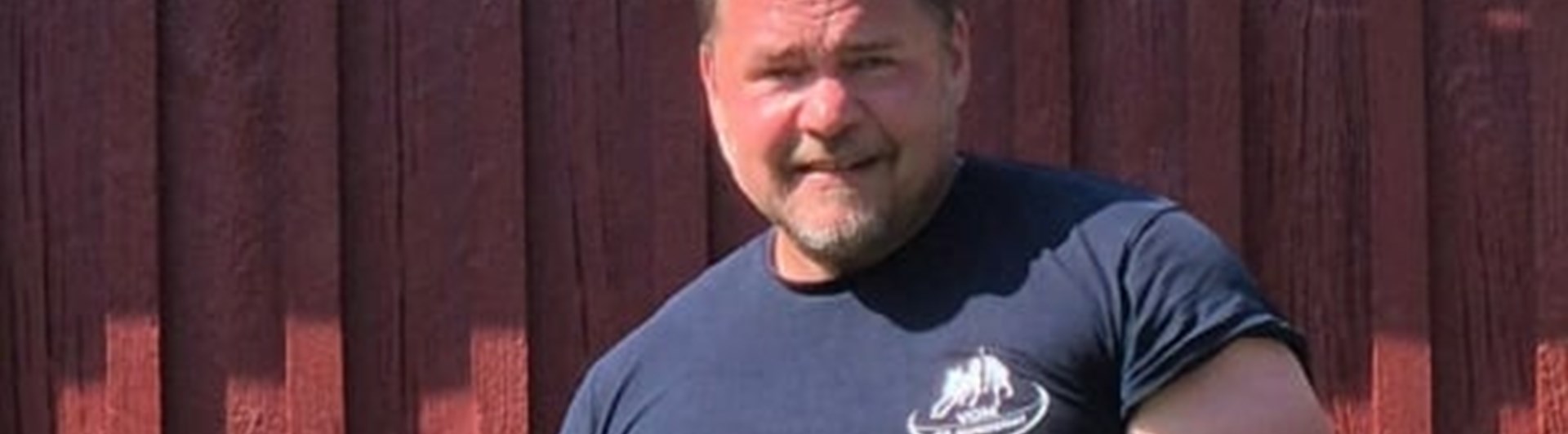 Förare med sin hund