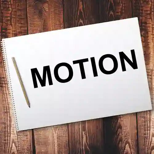Bild på ett anteckningsblock med texten motion.
