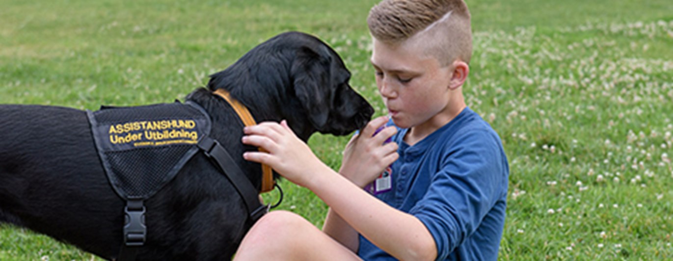 Pojke och hans Assistanshund