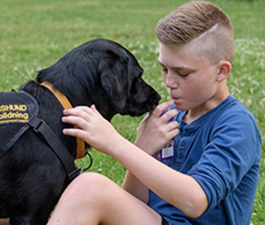 Pojke och hans Assistanshund