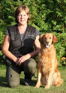 Bild på en förare och en hund