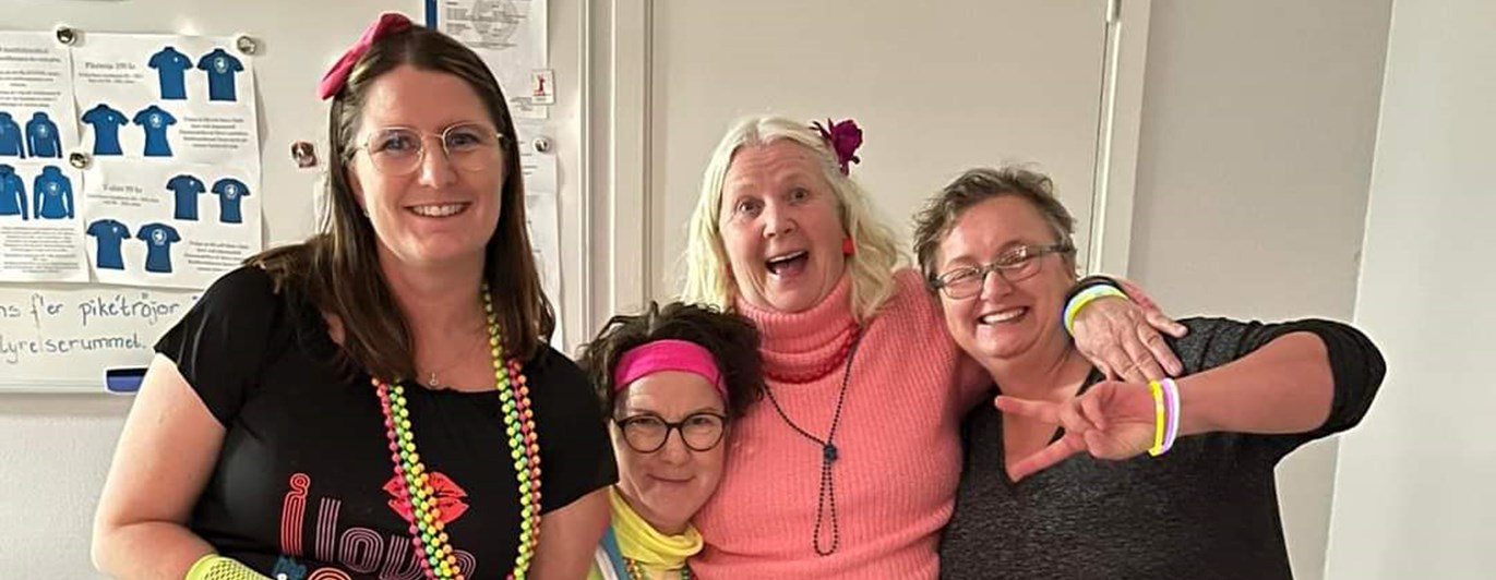 Fyra instruktörer i feststämning