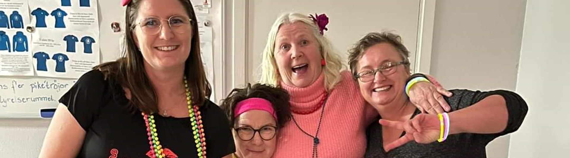 Fyra instruktörer i feststämning