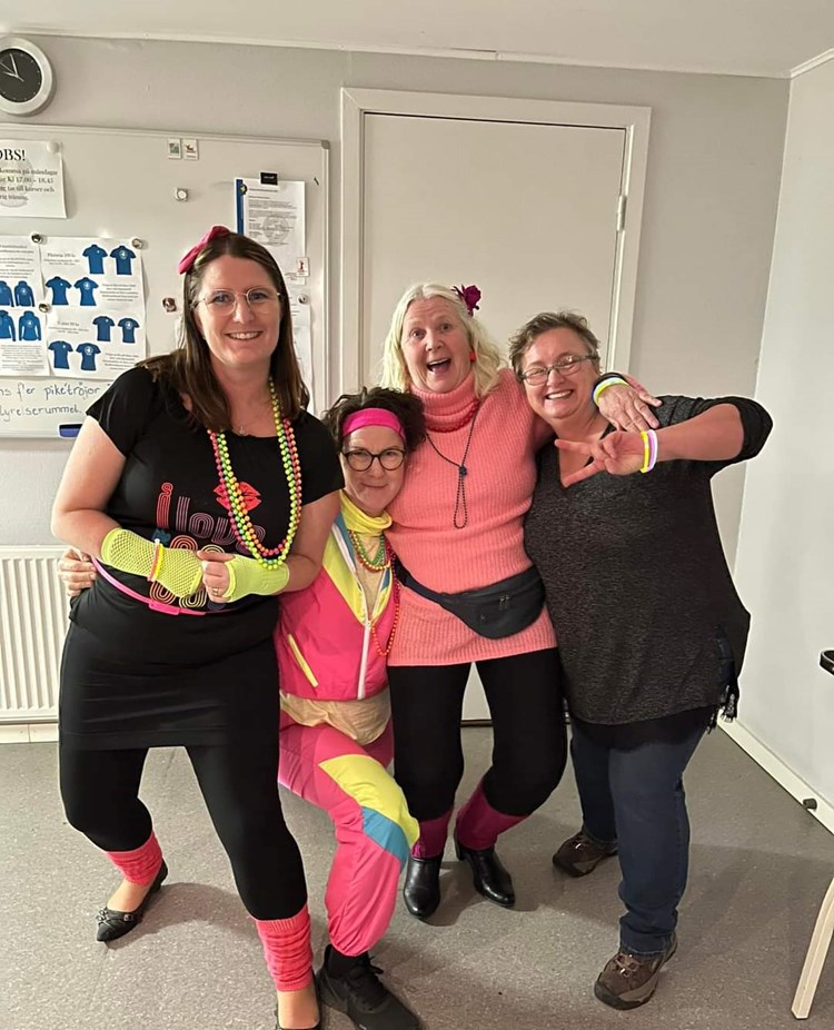 Fyra instruktörer i feststämning