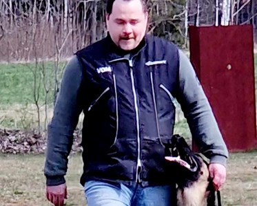 Hundförare med sin hund