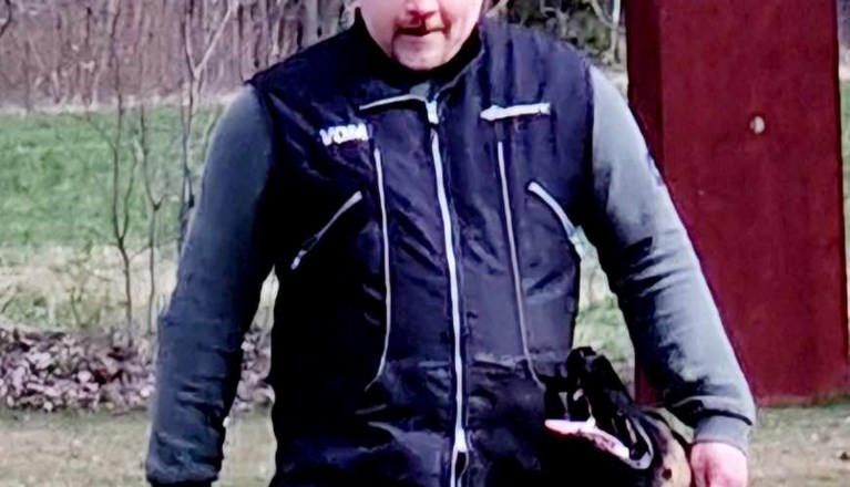 Hundförare med sin hund