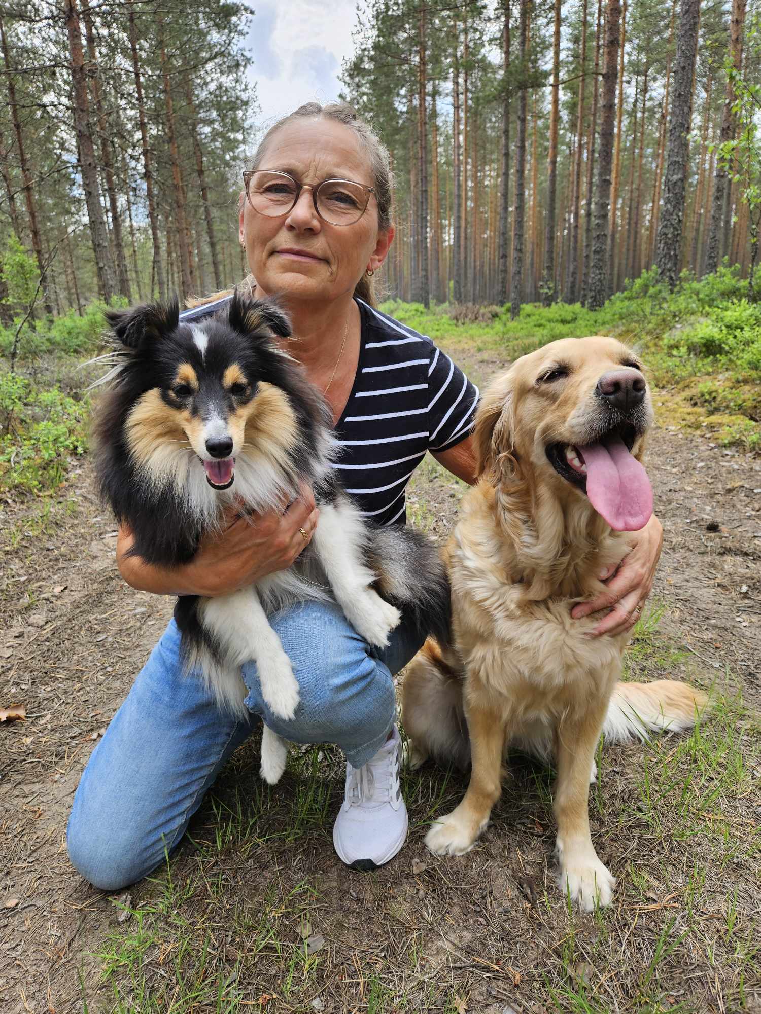 Lena Legnar med sina hundar