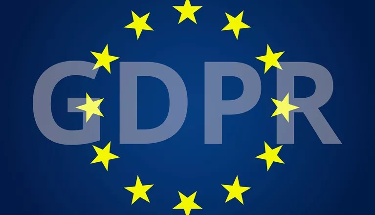Text GDPR på en blå bakgrund med gula stjärnor