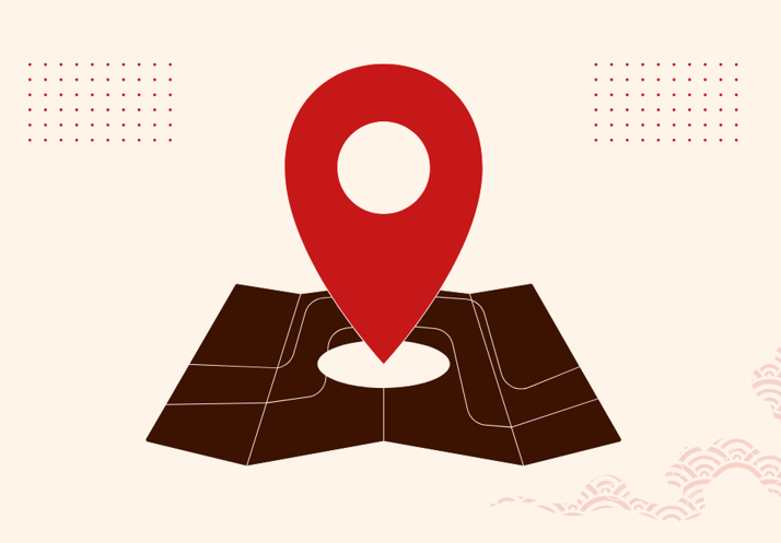 Bild på telefon med kartnål