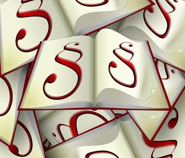 Bild som visar röda paragrafer i böcker.