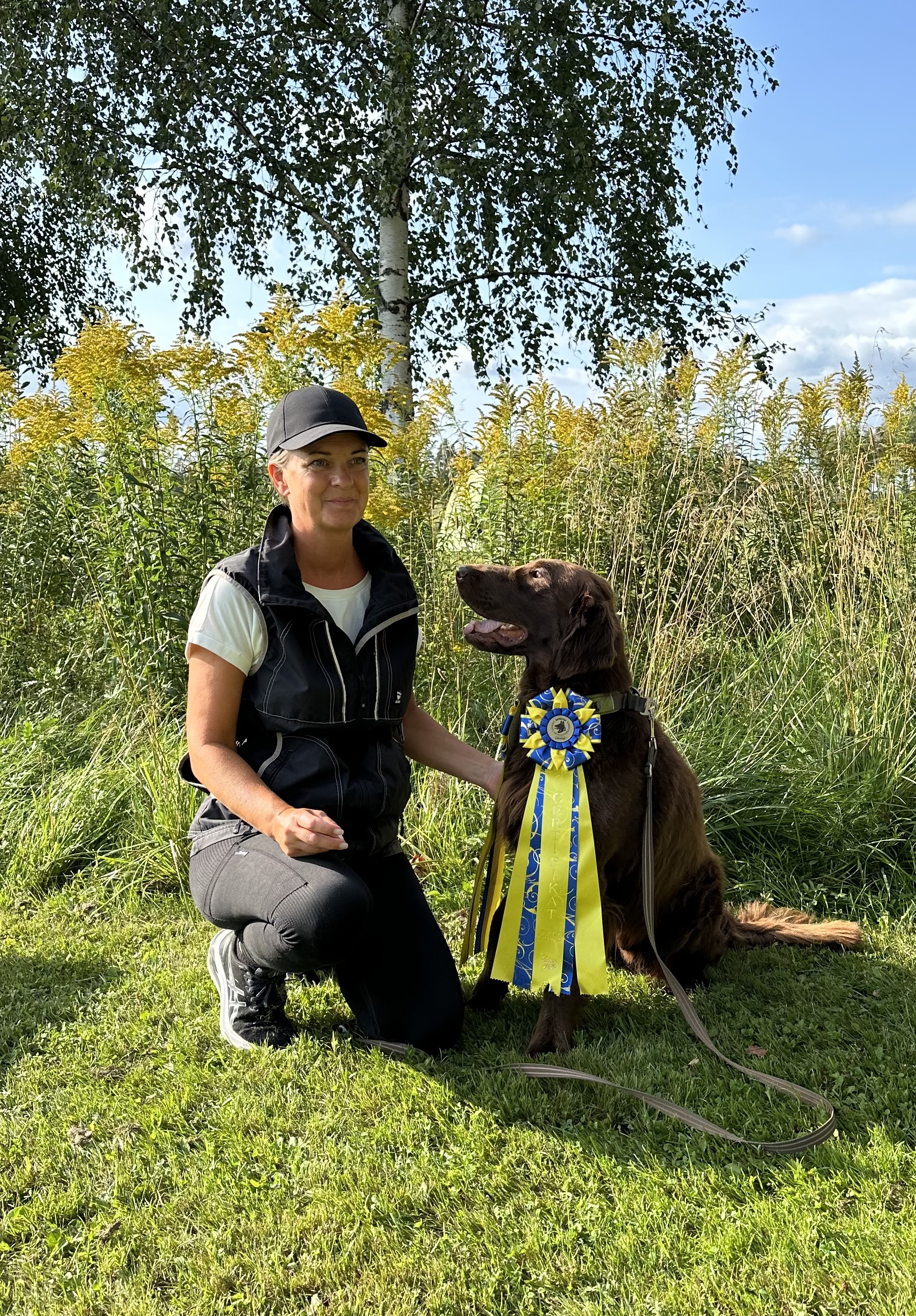 Helen och flat coated retriever Svante