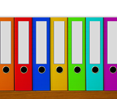 Bild som visar dokumentpärmar i färg.